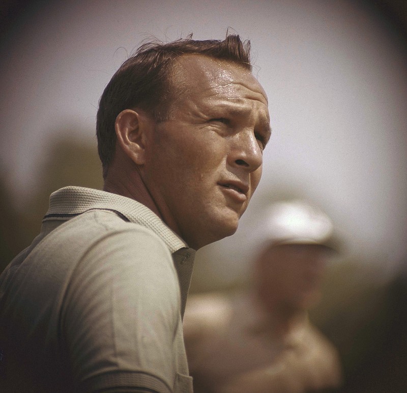 
              File-This jan. 28, 1962, file photo shows Arnold Palmer concentrating on his next move during the Lucky International Open at San Francisco's Harding Park. Palmer, who made golf popular for the masses with his hard-charging style, incomparable charisma and a personal touch that made him known throughout the golf world as "The King," died Sunday, Sept. 25, 2016, in Pittsburgh. He was 87. (AP Photo, File)
            