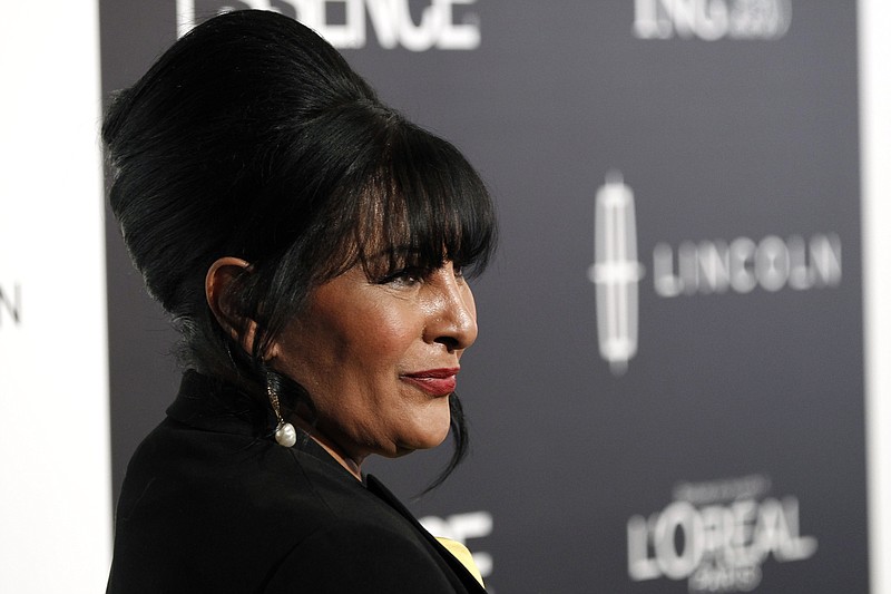 
              File-This Feb. 23, 2012, file photo shows honoree Pam Grier arriving at the 5th annual Essence Black Women in Hollywood Luncheon in Beverly Hills, Calif.  Grier and opera soprano Jessye Norman are among the recipients of Harvard University’s 2016 W.E.B. Du Bois medals honoring those who have made significant contributions to African and African American history and culture. Grier and Norman will be honored at the fourth annual Hutchins Center Honors on Oct. 6. (AP Photo/Matt Sayles, File)
            