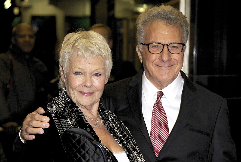 
              FILE - In this Nov. 12, 2014 file photo, actors Judi Dench, left, and Dustin Hoffman pose for photographers upon arrival at the screening of "Roald Dahl's Esio Trot: Deleted Scenes," in London. The pair are nominated for International Emmys for their roles in the BBC One TV movie. (Photo by Grant Pollard/Invision/AP, File)
            