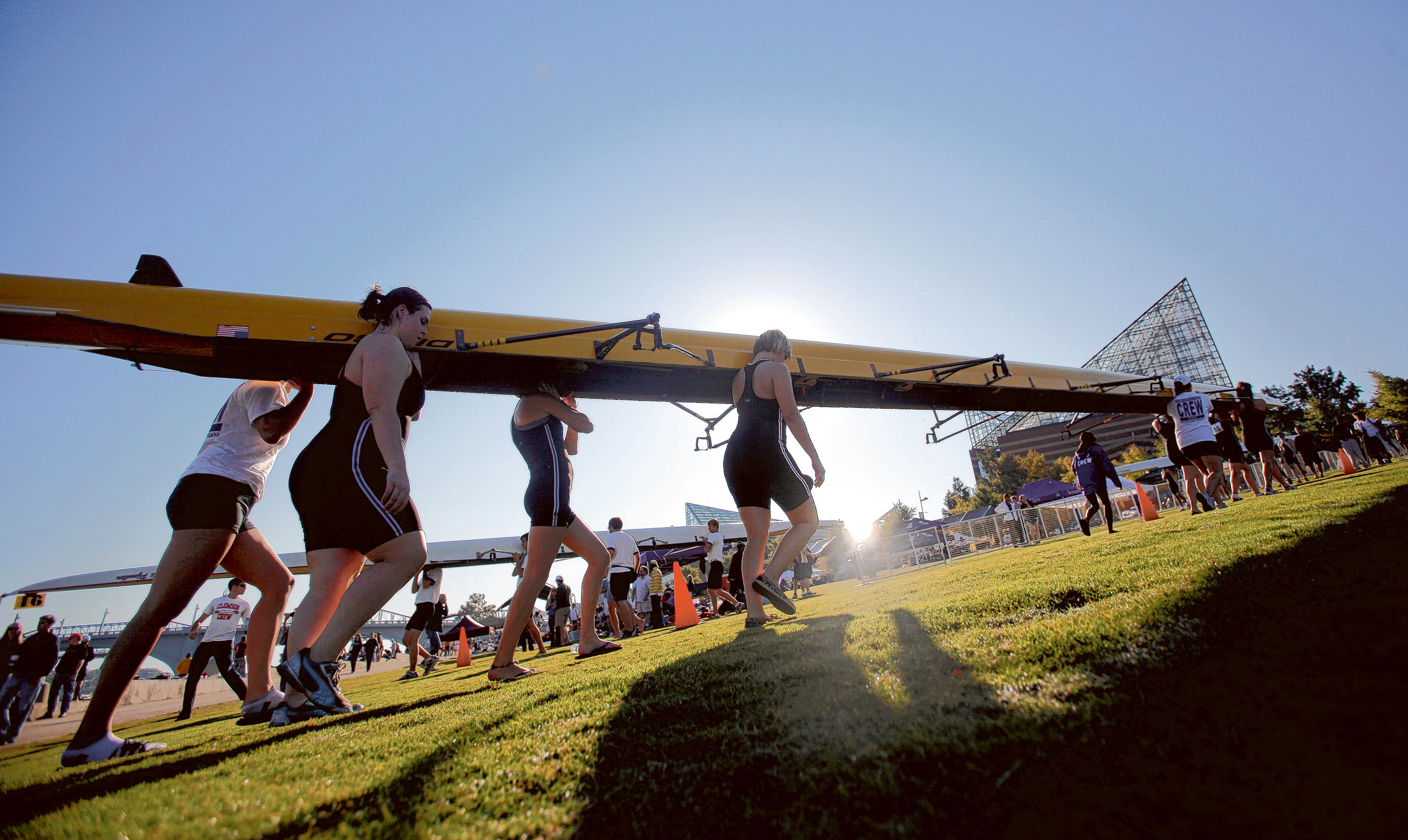 A team moves their boat up the hill from Ross's Landing after making a run on the course Saturday morning. More than 1200 competitors in 35 teams from nine states competed in the Chattanooga Head Race on Saturday, according to Regatta Director Mike Connors {CQ}. Connors said Saturday's event, which is in its 19th year, was the largest yet. The race's course began and ended at Ross's Landing and stretched up the Tennessee River.