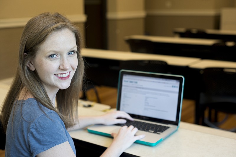 LSU mass communication graduate student Danielle Kelley browses on her laptop on Thursday, Sept. 23, 2016, in the Journalism Building. She is responsible for building an organ transplant database in her search to find the Chattanooga family whose deceased relative donated organs to Danielle's grandmother. 