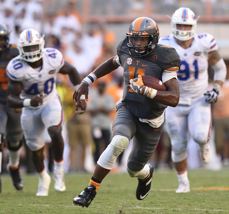 Joshua Dobbs (11) runs for yardage.  The Florida Gators visited the Tennessee Volunteers in a important SEC football contest at Neyland Stadium on September 24, 2016.