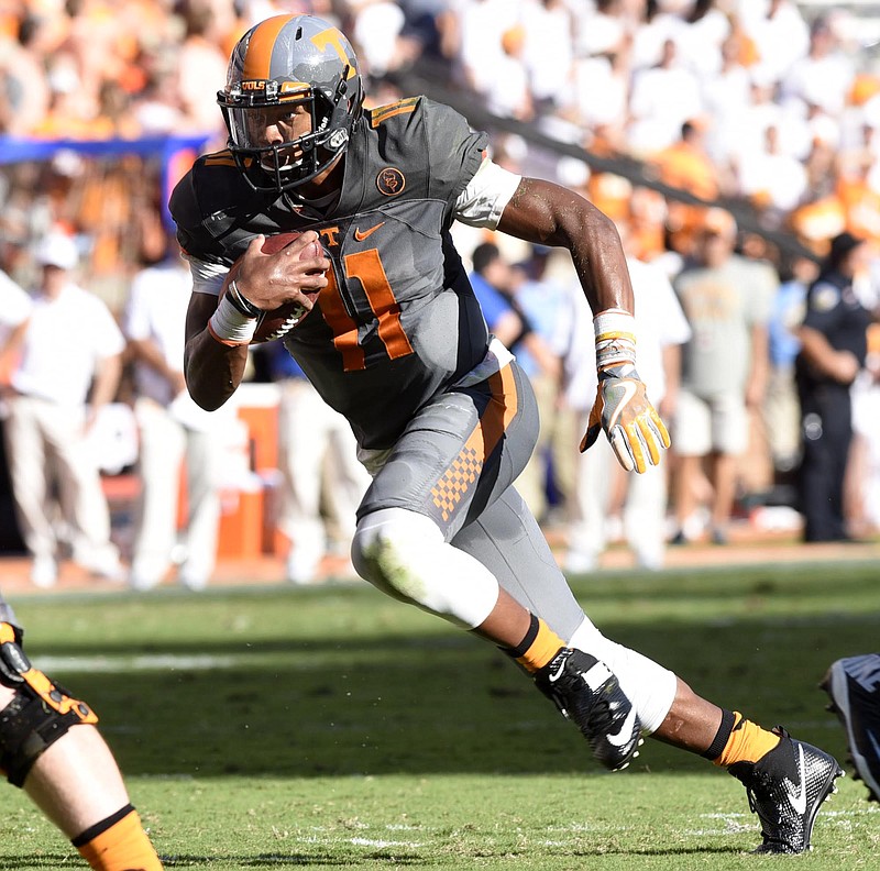 Joshua Dobbs (11) starts off on a run.  The Florida Gators visited the Tennessee Volunteers in a important SEC football contest at Neyland Stadium on September 24, 2016.