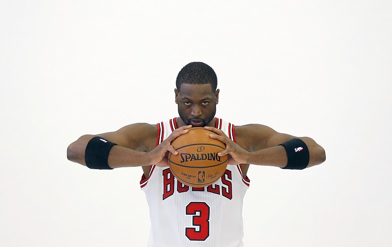 
              Chicago Bulls' Dwyane Wade poses for a portrait during the NBA basketball team's media day Monday, Sept. 26, 2016, in Chicago. (AP Photo/Charles Rex Arbogast)
            