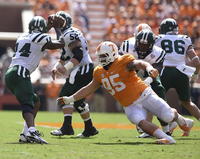 Tennessee defensive tackle Danny O'Brien pressures Ohio quarterback Greg Windham during their game earlier this month at Neyland Stadium. O'Brien and fellow tackle Kendal Vickers have been reliable veterans for the Vols this season.