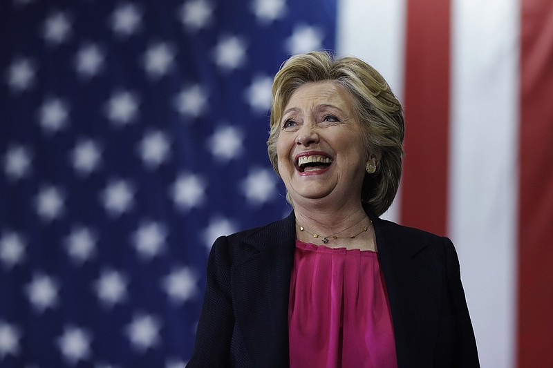 
              Democratic presidential candidate Hillary Clinton takes the stage at a campaign stop at Wake Technical Community College in Raleigh, N.C., Tuesday, Sept. 27, 2016. (AP Photo/Matt Rourke)
            