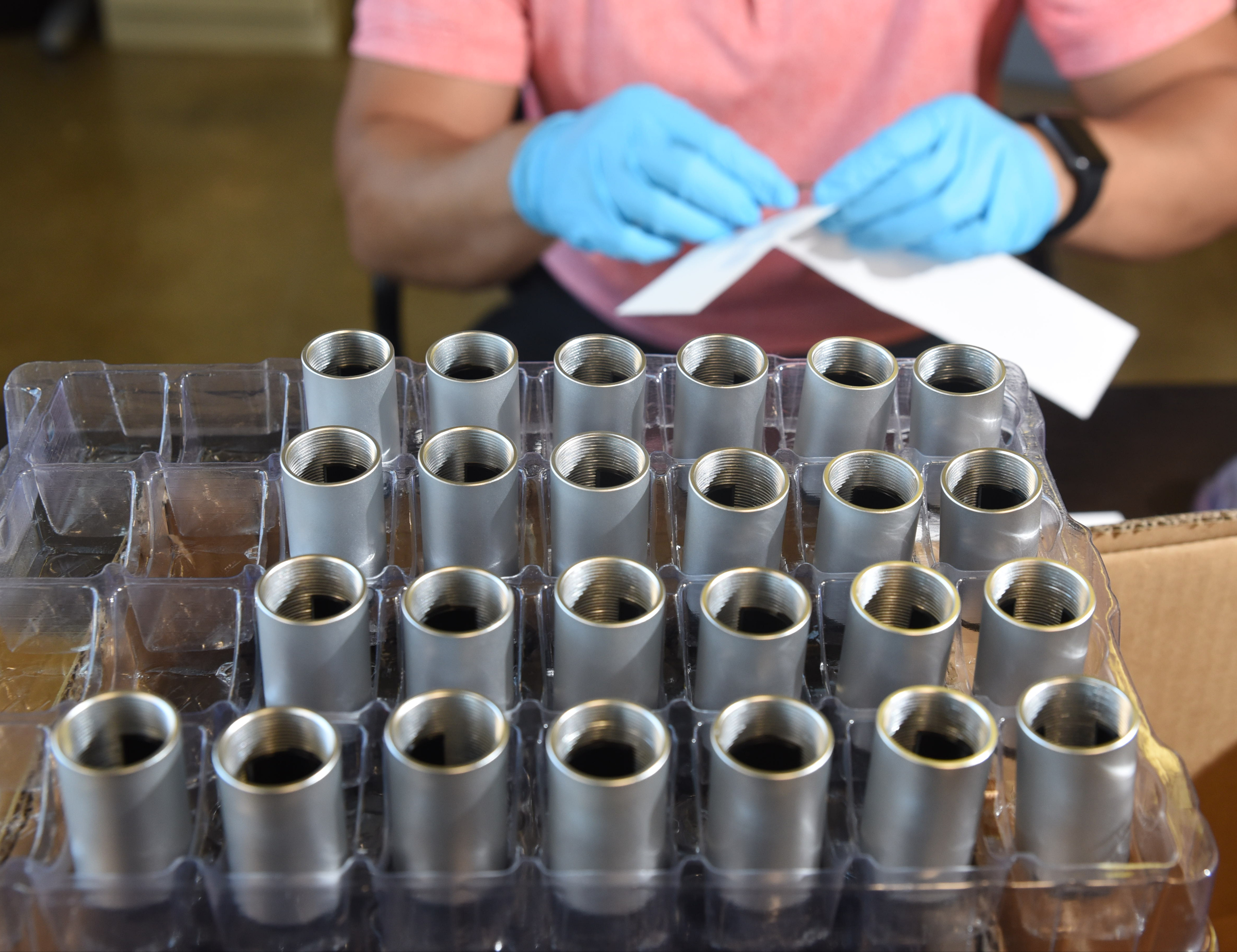 George Yu, founder and CEO of Variable, Inc., assembles ColorMuse units in the lab on Cherokee Blvd.