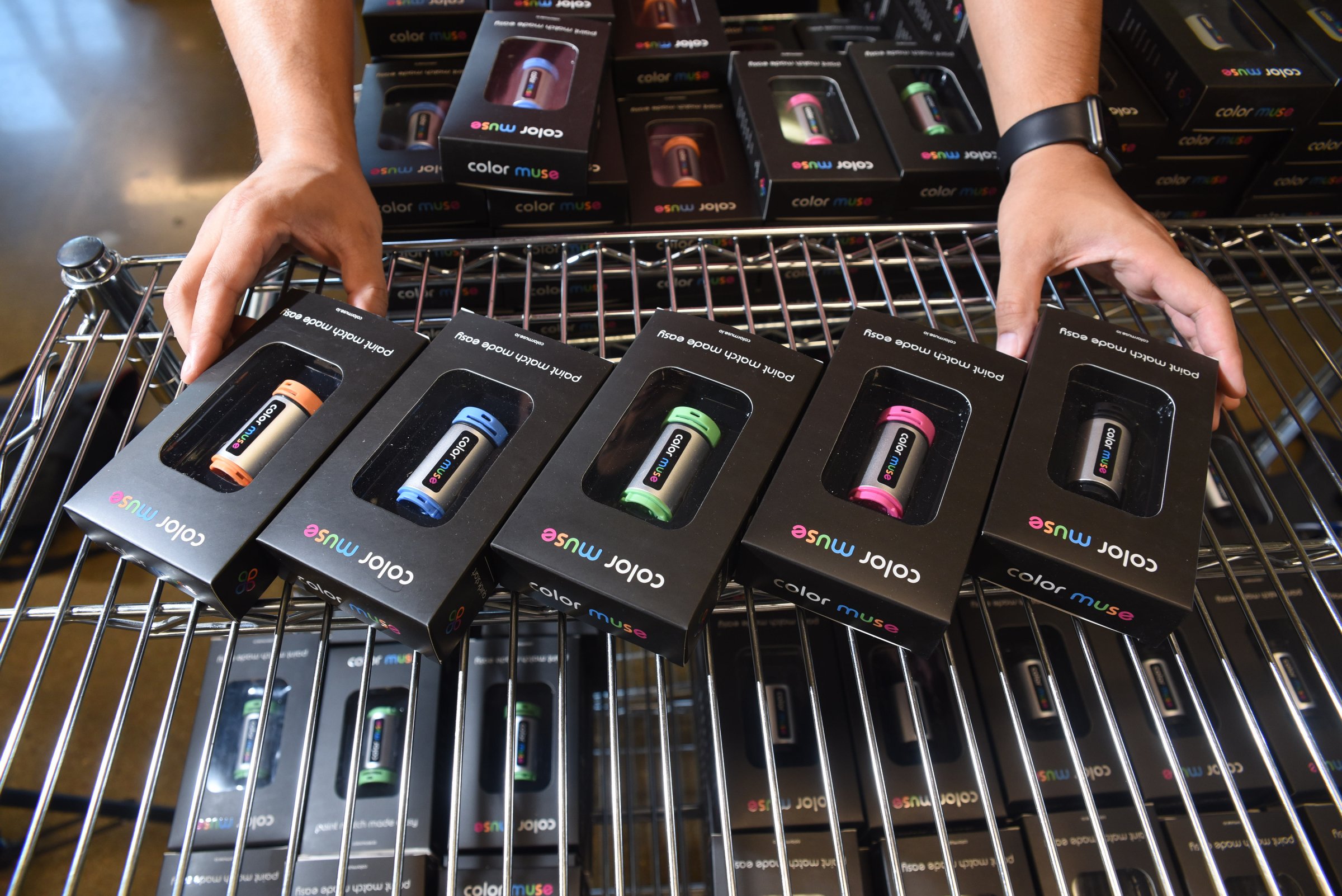 George Yu, founder and CEO of Variable, Inc., displays ColorMuse units in packaging in the lab on Cherokee Blvd.