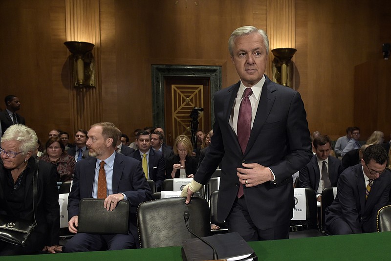 
              FILE - In this Tuesday, Sept. 20, 2016, file photo, Wells Fargo CEO John Stumpf arrives to testify before the Senate Banking Committee, on Capitol Hill in Washington. Stumpf, newly stripped of tens of millions of dollars in compensation in a scandal over sales practices, is scheduled to appear before the House Financial Services Committee on Thursday, Sept. 29. (AP Photo/Susan Walsh, File)
            