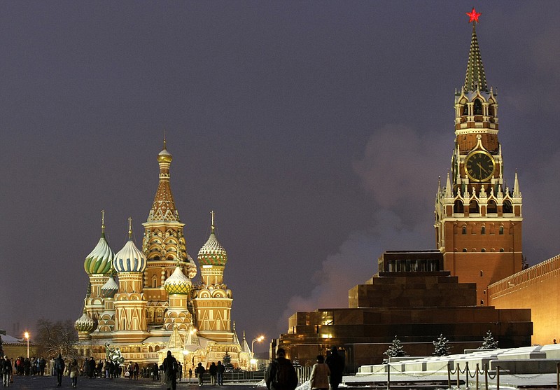 
              FILE - In this Dec. 10, 2009, file photo, people walk in Red Square, with St. Basil Cathedral, left, the Kremlin's Spassky Tower, right back, and Lenin Mausoleum, right, in Moscow, Russia. Russia cannot be ignored. Since the end of the Cold War, Russia has never posed such a vexing problem to U.S. policymakers as it does now. From Eastern Europe to the Middle East and increasingly Asia and the Americas, Russia is making its voice heard and its presence felt. (AP Photo/Misha Japaridze, File)
            