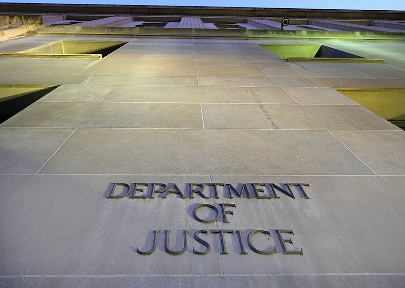 
              FILE - In this May 14, 2013, file photo, the Department of Justice headquarters building in Washington is photographed early in the morning. The Drug Enforcement Administration does a poor job overseeing the millions of dollars in payments it distributes to confidential sources, relies on tipsters who operate with minimal oversight or direction and has paid informants who are no longer meant to be used, according to a government watchdog report issued Thursday, Sept. 29, 2016.


. (AP Photo/J. David Ake, File)
            