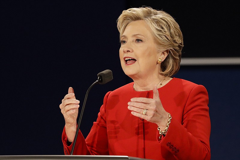 
              In this Sept. 26, 2016, photo, Democratic presidential candidate Hillary Clinton answers a question during the presidential debate with Republican presidential candidate Donald Trump at Hofstra University in Hempstead, N.Y. Clinton has vowed to respond to foreign hacking the same as any other attack against the United States. She’s openly blamed Russia for recent U.S. cyber break-ins while Donald Trump wondered if overseas governments or overweight hackers at home were responsible. (AP Photo/David Goldman)
            