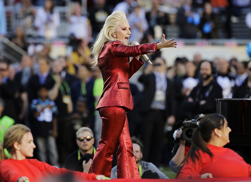 
              FILE - In this Feb. 7, 2016 file photo, Lady Gaga sings the national anthem before the NFL Super Bowl 50 football game between the Denver Broncos and the Carolina Panthers in Santa Clara, Calif. Lady Gaga will headline the Super Bowl halftime show next year. NFL and Pepsi announced Thursday, Sept. 29, 2016, that the pop star will take the stage on Feb. 5, 2017, at the NRG Stadium in Houston. (AP Photo/Julio Cortez, File)
            