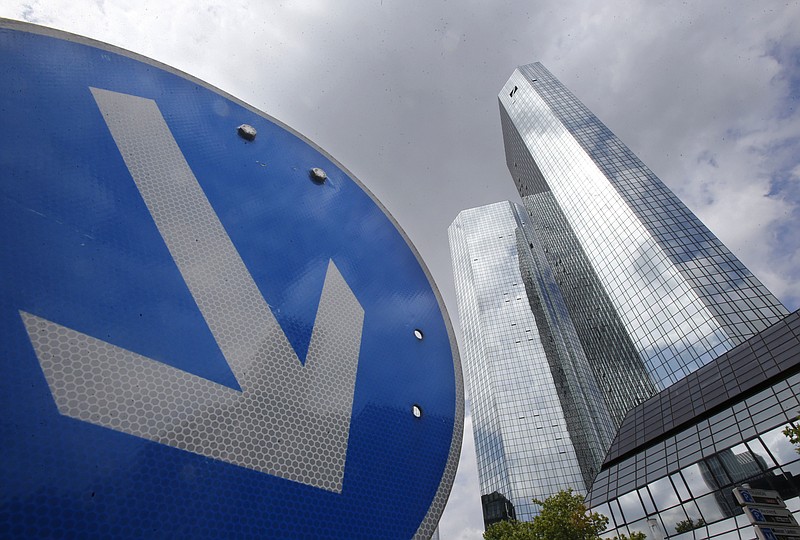
              FILE - In this June 9, 2015 file photo the headquarters of Deutsche Bank is photographed in Frankfurt, Germany.   (AP Photo/Michael Probst, file)
            
