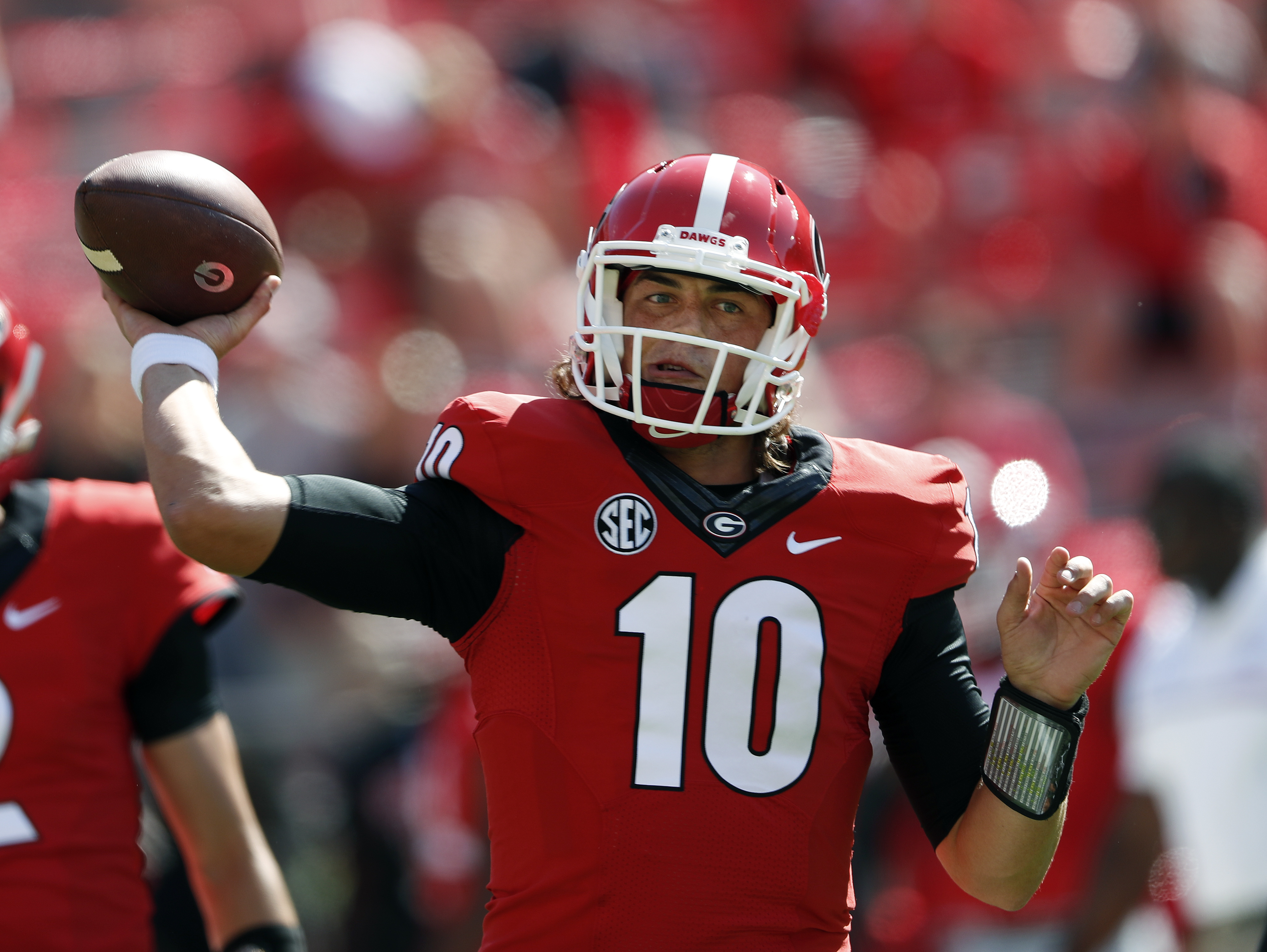 Georgia quarterback Jacob Eason (10) warms up before an NCAA college football game against Tennessee, Saturday, Oct. 1, 2016, in Athens, Ga. (AP Photo/John Bazemore)