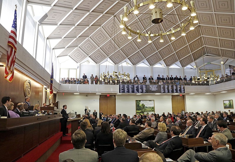 
              FILE- In this March 4, 2015, file photo, North Carolina Chief Justice Mark Martin delivers his State of the Judiciary address to a joint session of the General Assembly. Republicans control both the Senate and the House and are expected to retain their majorities following the November elections. Democrats, however, are seeking to flip enough seats to end the GOP’s veto-proof majorities in one or both chambers. (AP Photo/Gerry Broome, File)
            