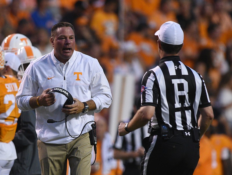 UT coach Butch Jones talks to an official during the game against Appalachian State Thursday, Sept. 1, 2016 in Neyland Stadium.