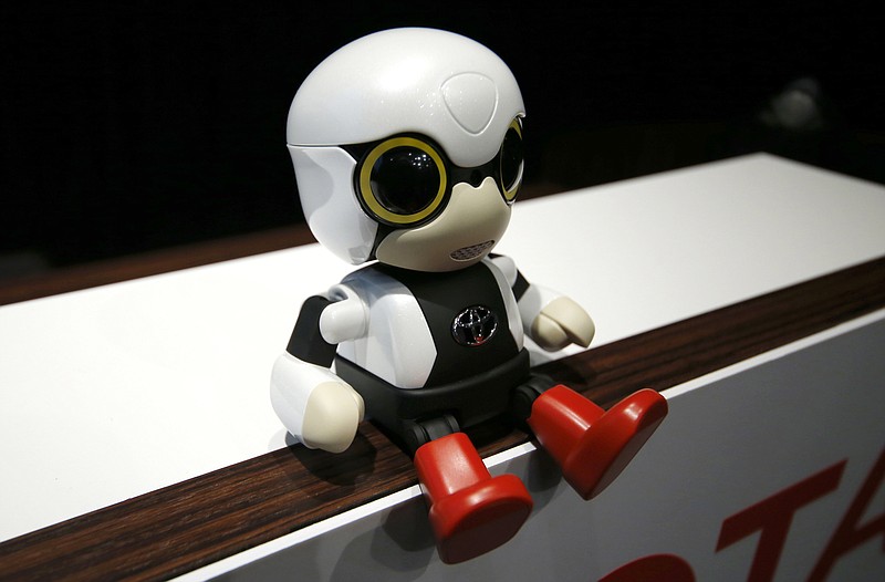 
              In this Sept. 27, 2016 photo, Toyota Motor Corp.'s Kirobo Mini, a compact sized humanoid communication robot, sits during a press unveiling in Tokyo. The new robot from Japanese automaker Toyota Motor Corp. can't do much but chatter in a high-pitched voice. (AP Photo/Shizuo Kambayashi)
            