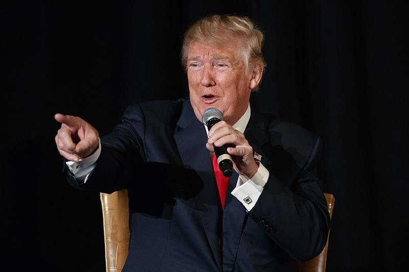 
              Republican presidential candidate Donald Trump speaks during a town hall with the Retired American Warriors, Monday, Oct. 3, 2016, in Herndon, Va. (AP Photo/ Evan Vucci)
            