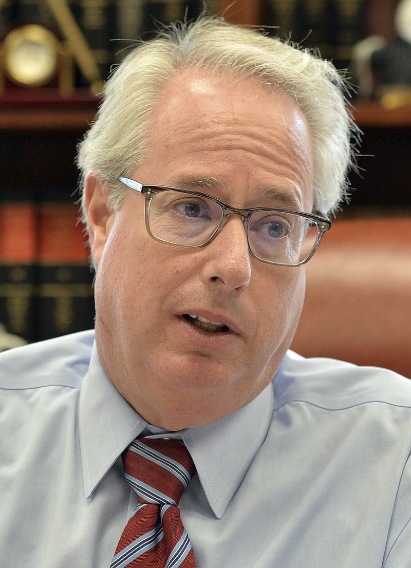 
              In this photo taken Thursday, Sept. 2, 2014 Georgia Attorney General Sam Olens speaks at his office,in Atlanta. University System of Georgia Chancellor Hank Huckaby said in a letter sent Monday, Oct. 3, 2016, to students and faculty of Georgia's third-largest university that a committee of the university system's governing Board of Regents will interview Olens on Tuesday in Atlanta. Huckaby said that he initially planned a national search for the school's next president but now believes Olens should be considered.(Hyosub Shin/Atlanta Journal-Constitution via AP))
            