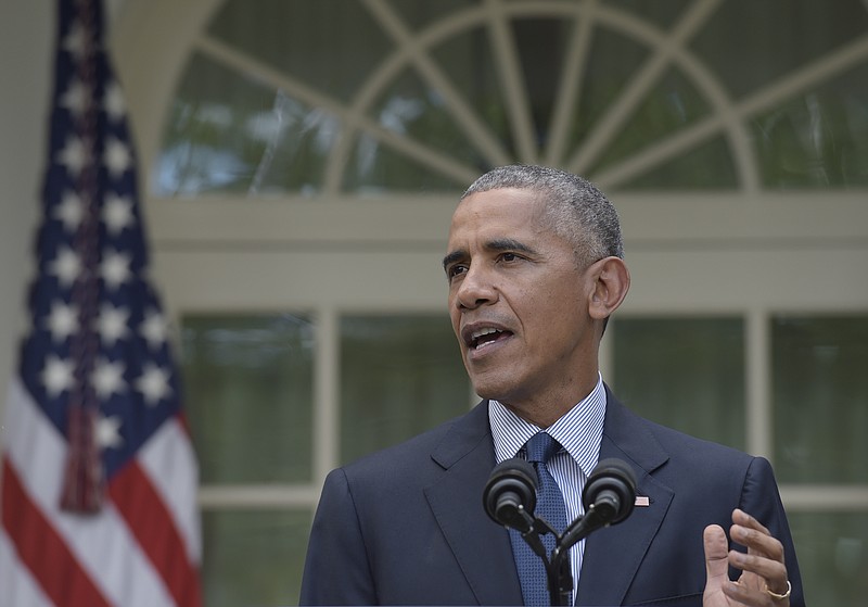 
              President Barack Obama speaks in the Rose Garden of the White House in Washington, Wednesday, Oct. 5, 2016, where he welcomed the news that the Paris agreement on climate change will take effect in a month as a historic achievement. (AP Photo/Susan Walsh)
            