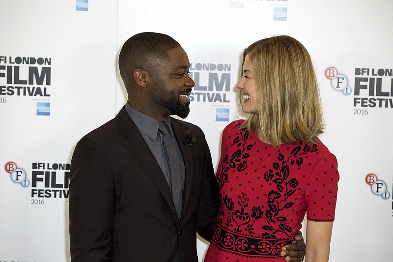 
              Actors David Oyelowo and Rosamund Pike pose for photographers at the photo call for the film 'A United Kingdom', which opens the London Film Festival in London, Wednesday, Oct. 5, 2016. The festival runs from Oct. 5 until Oct. 16. (Photo by Grant Pollard/Invision/AP)
            