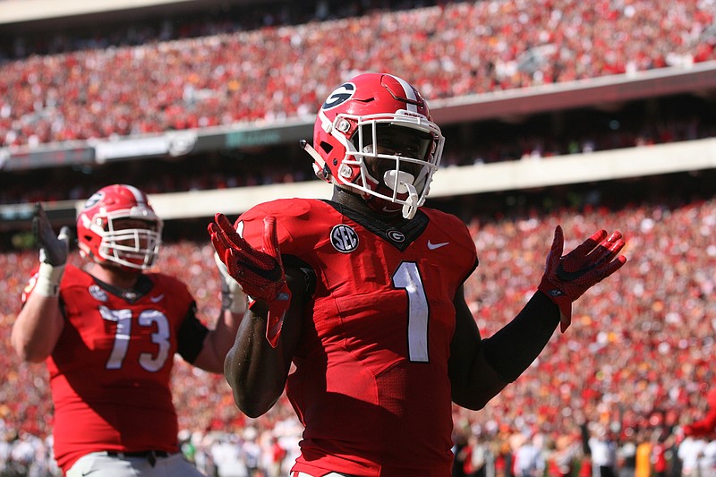 Georgia junior tailback Sony Michel celebrates after scoring the first touchdown of last Saturday's eventual 34-31 loss to Tennessee.