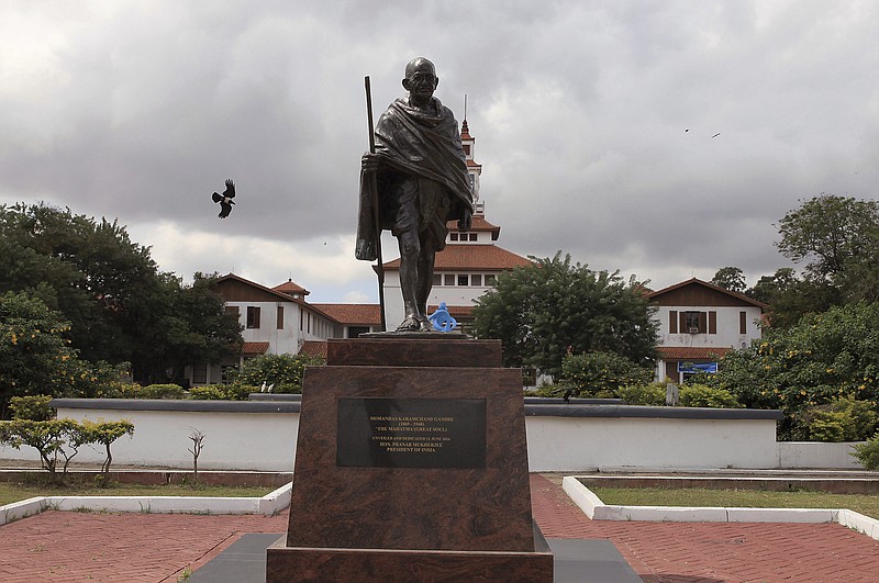 
              FILE-In this Thursday, Sept. 22, 2016 file photo, a statue of Indian independence leader Mohandas Gandhi in Accra, Ghana,  Ghana has expressed its intention to remove a statue of Indian independence leader Mohandas Gandhi from a university in the capital, citing a controversy over what critics call his “racist identity.” (AP Photo/Christian Thompson, File)
            
