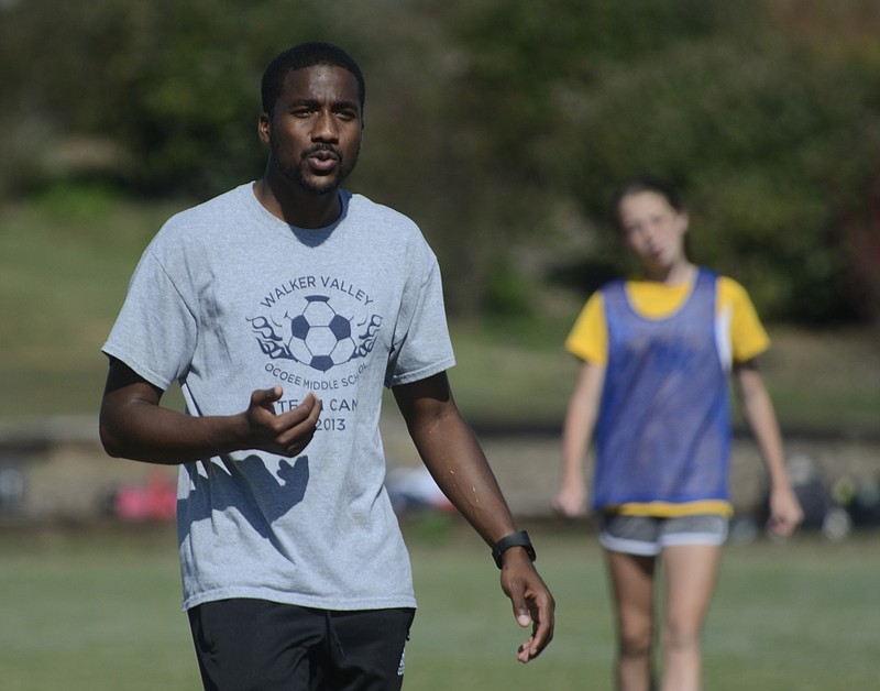 Oct 10, 2013--
Soccer coach Nathan Brown talks to girls Thursday during practice at Walker Valley High School.