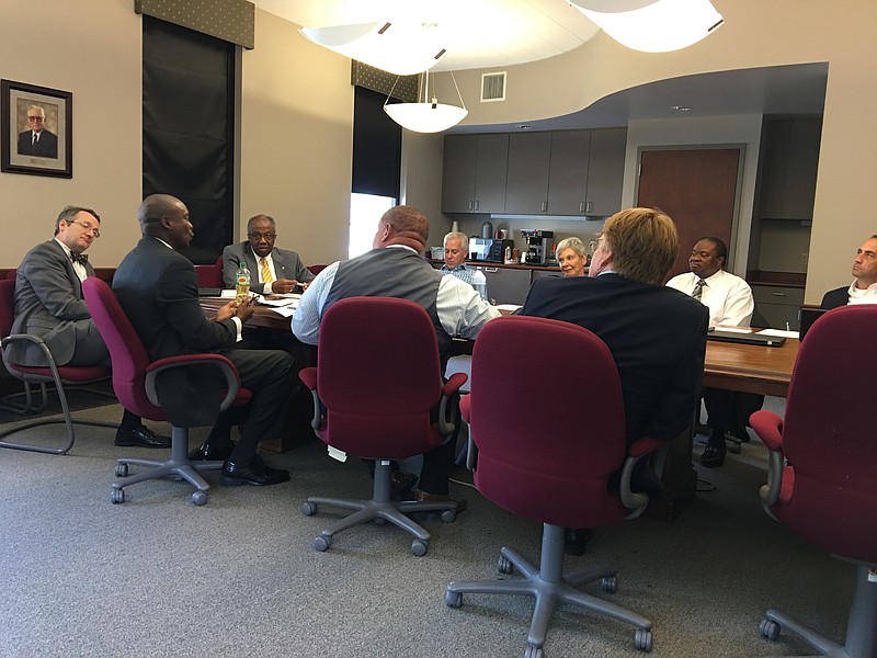 Regional Planning Agency Executive Director John Bridger and City Attorney Wade Hinton, left, discuss short-term vacation rental legislation with the Chattanooga City Council.