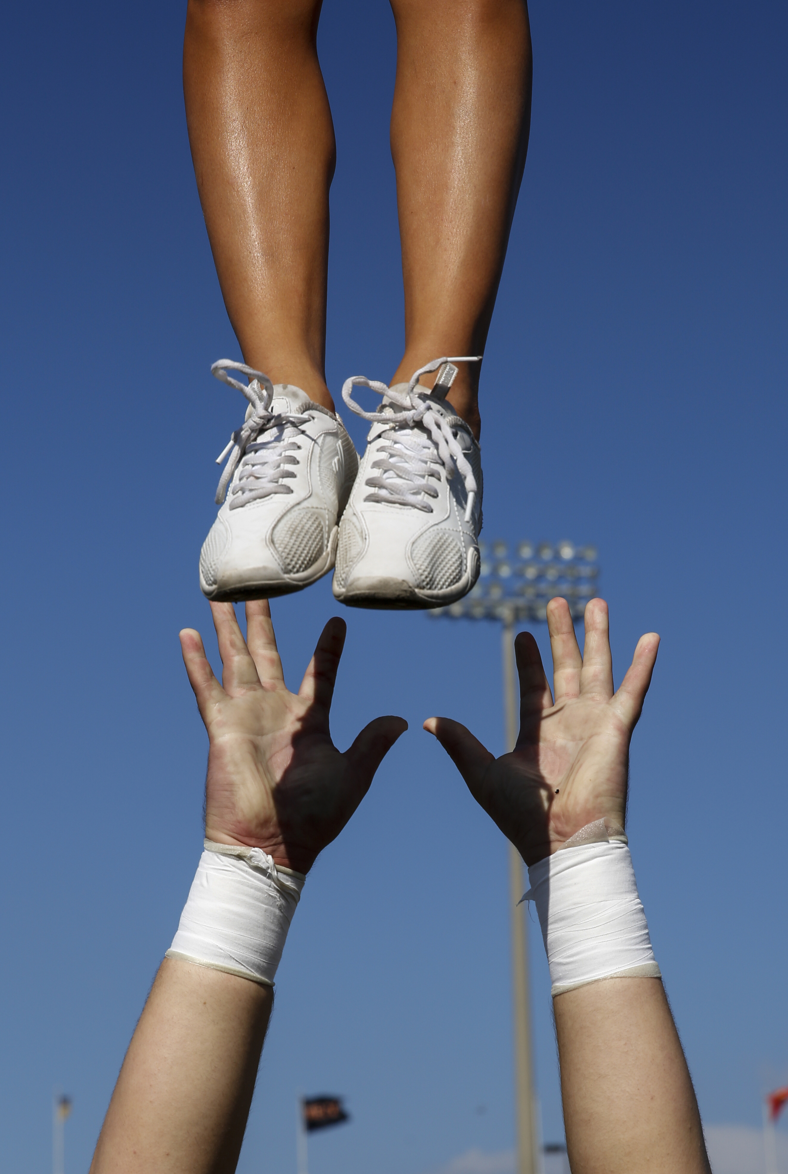 A UTC cheerleader prepares to catch another cheerleader during the Mocs' home football game against the Mercer Bears at Finley Stadium on Saturday, Oct. 8, 2016, in Chattanooga, Tenn.