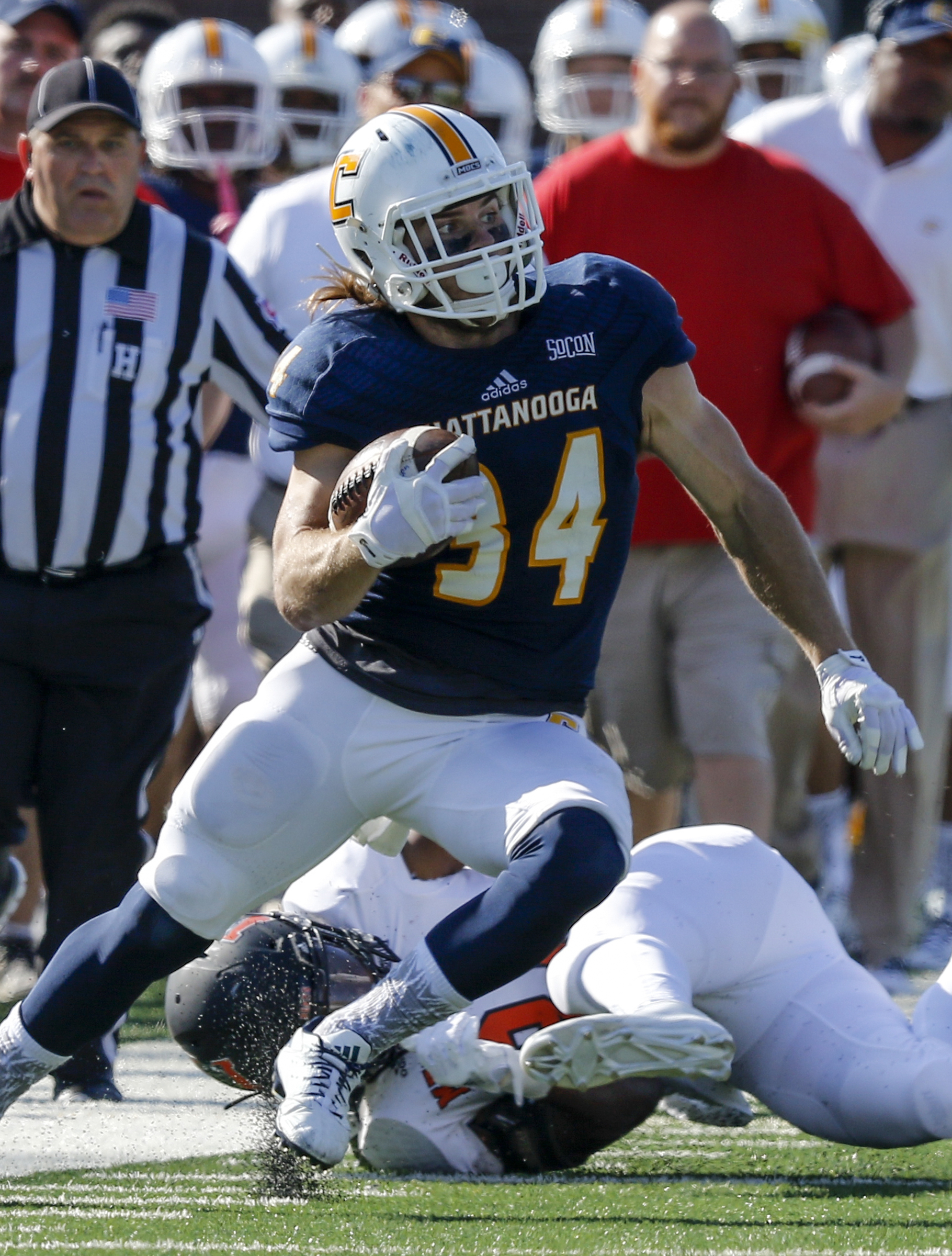 UTC running back Derrick Craine evades Mercer defensive back Eric Jackson during the Mocs' home football game against the Mercer Bears at Finley Stadium on Saturday, Oct. 8, 2016, in Chattanooga, Tenn.