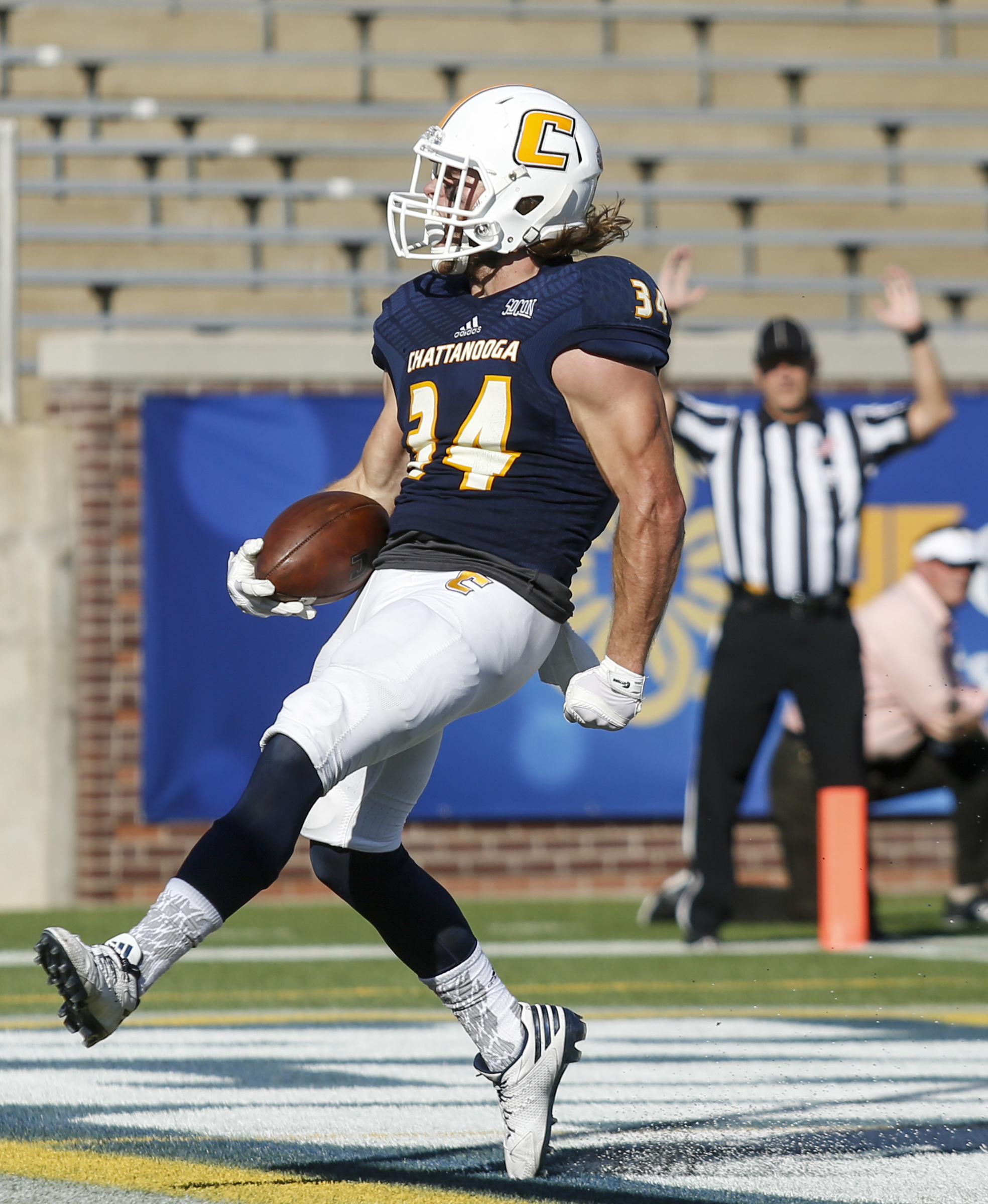 UTC running back Derrick Craine strides into the end zone for a touchdown during the Mocs' home football game against the Mercer Bears at Finley Stadium on Saturday, Oct. 8, 2016, in Chattanooga, Tenn.
