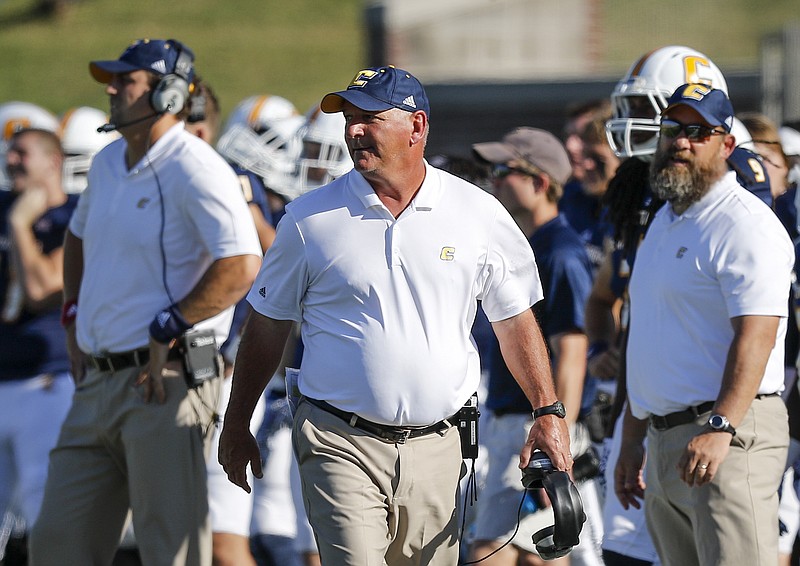 UTC head football coach Russ Huesman paces the sidelines during the Mocs' home football game against the Mercer Bears at Finley Stadium on Saturday, Oct. 8, 2016, in Chattanooga, Tenn.