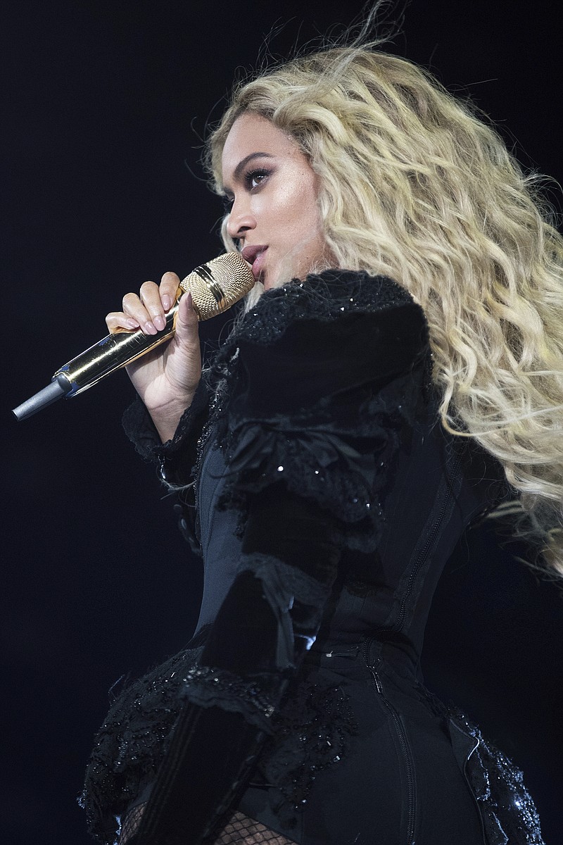 
              This photo taken Sept. 24, 20016, shows Beyonce performing during the Formation World Tour at Mercedes-Benz Superdome, in New Orleans.  Beyoncé wrapped up her "Formation World Tour" with onstage assists from Jay Z, Kendrick Lamar and Serena Williams, while Hugh Jackman, Tyler Perry and Frank Ocean watched from the crowd. The pop star performed Friday, Oct. 7, 2016, at the MetLife Stadium in East Rutherford, New Jersey, singing and dancing to songs from her six solo albums, including her latest effort, "Lemonade." (Daniela Vesco/Invision for Parkwood Entertainment/AP Images)
            