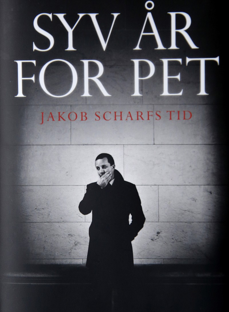 
              The book cover of "Seven Years for PET" in Copenhagen, Friday, Oct 7, 2016. Two large Danish media and 40 book stores across Denmark have been ordered by a court of law not to publish or sell a book based on interviews of the country's domestic intelligence agency's former chief, Jakob Scharf. The court injunction was made at the request of Denmark's Security and Intelligence Service, known as PET, that feared the book could contain secrets. (Jens Dresling/Polfoto via AP)
            