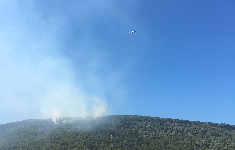 This contributed photo shows a helicopter that was used Oct. 8 to battle a fire alongside Roberts Mill Road on Walden's Ridge.

