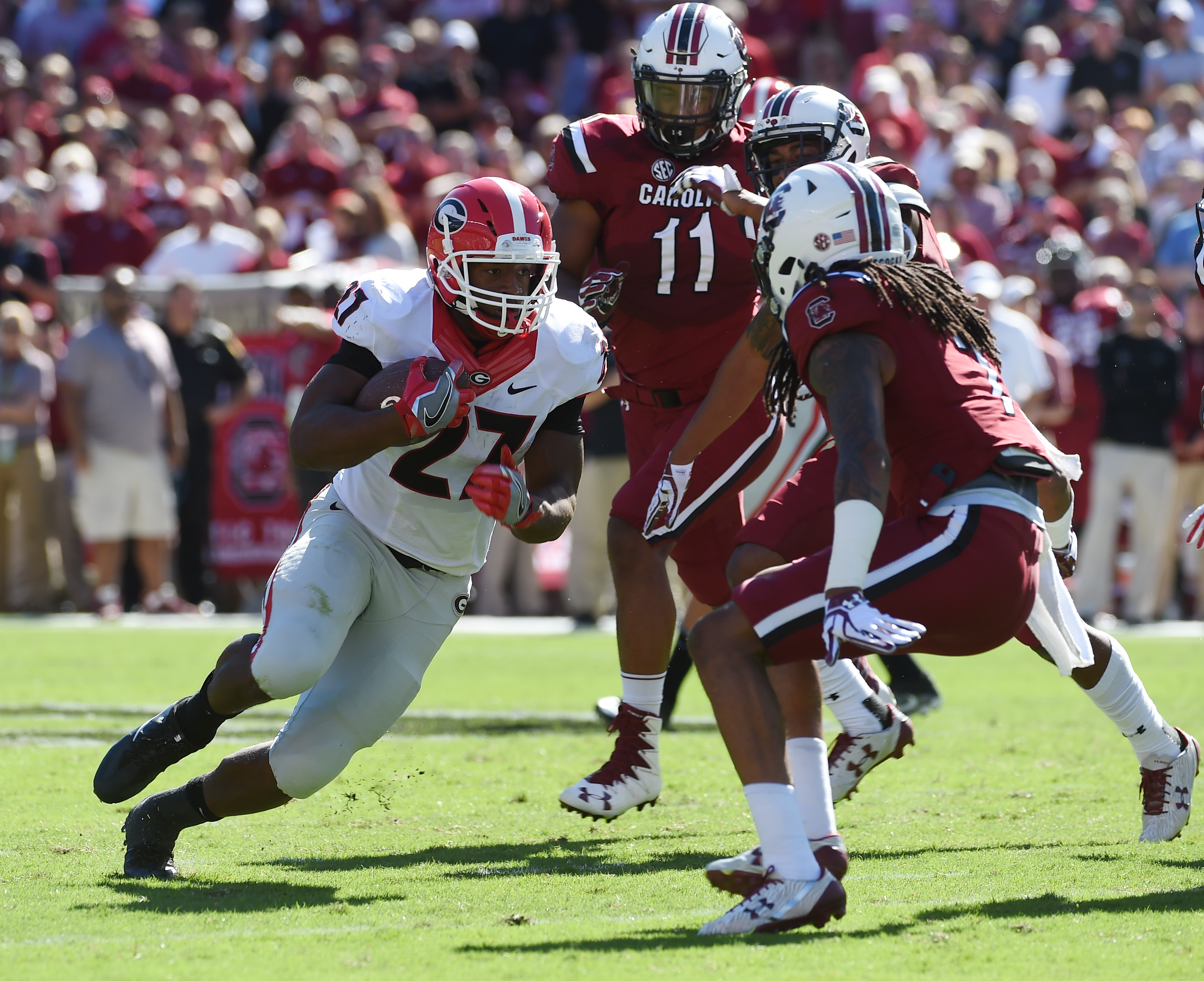 Georgia running back Nick Chubb (27) runs against South Carolina during the first half of an NCAA college football game on Sunday, Oct. 9, 2016, in Columbia, S.C. (AP Photo/Rainier Ehrhardt)