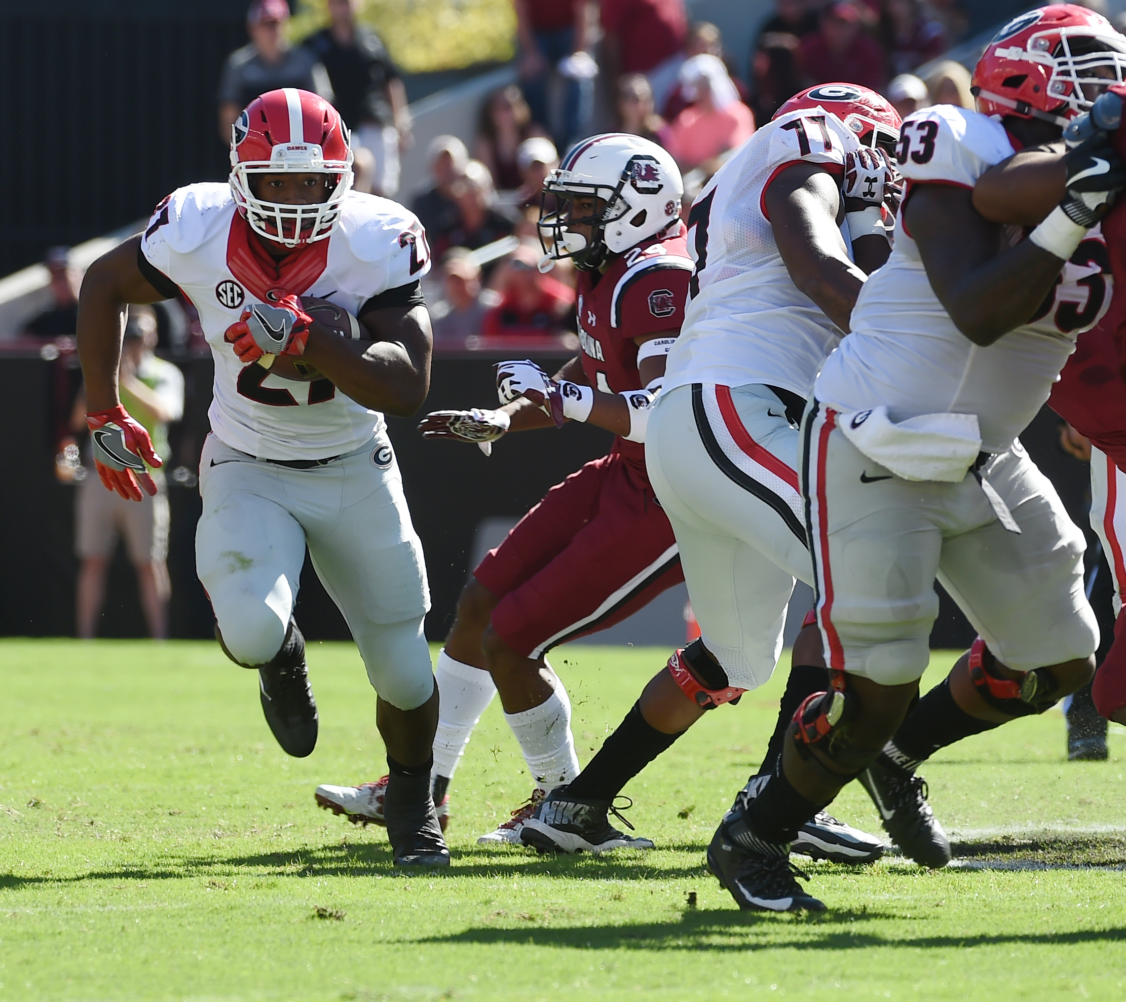 Georgia running back Nick Chubb (27) runs against South Carolina during the first half of an NCAA college football game on Sunday, Oct. 9, 2016, in Columbia, S.C. (AP Photo/Rainier Ehrhardt)