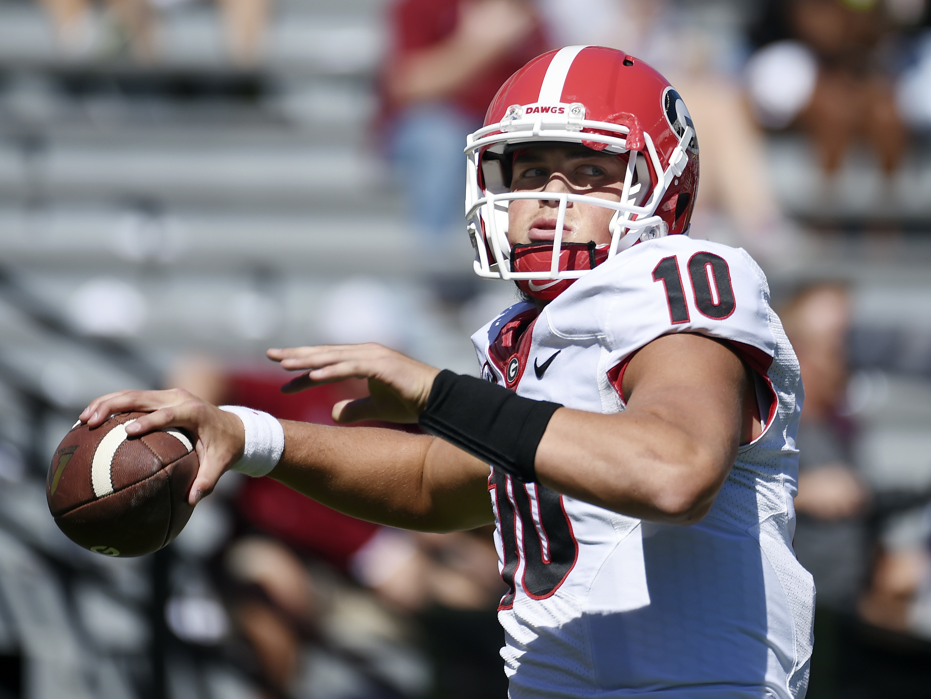 Georgia quarterback Jacob Eason (10) warms up before an NCAA college football game against South Carolina on Sunday, Oct. 9, 2016, in Columbia, S.C. (AP Photo/Rainier Ehrhardt)