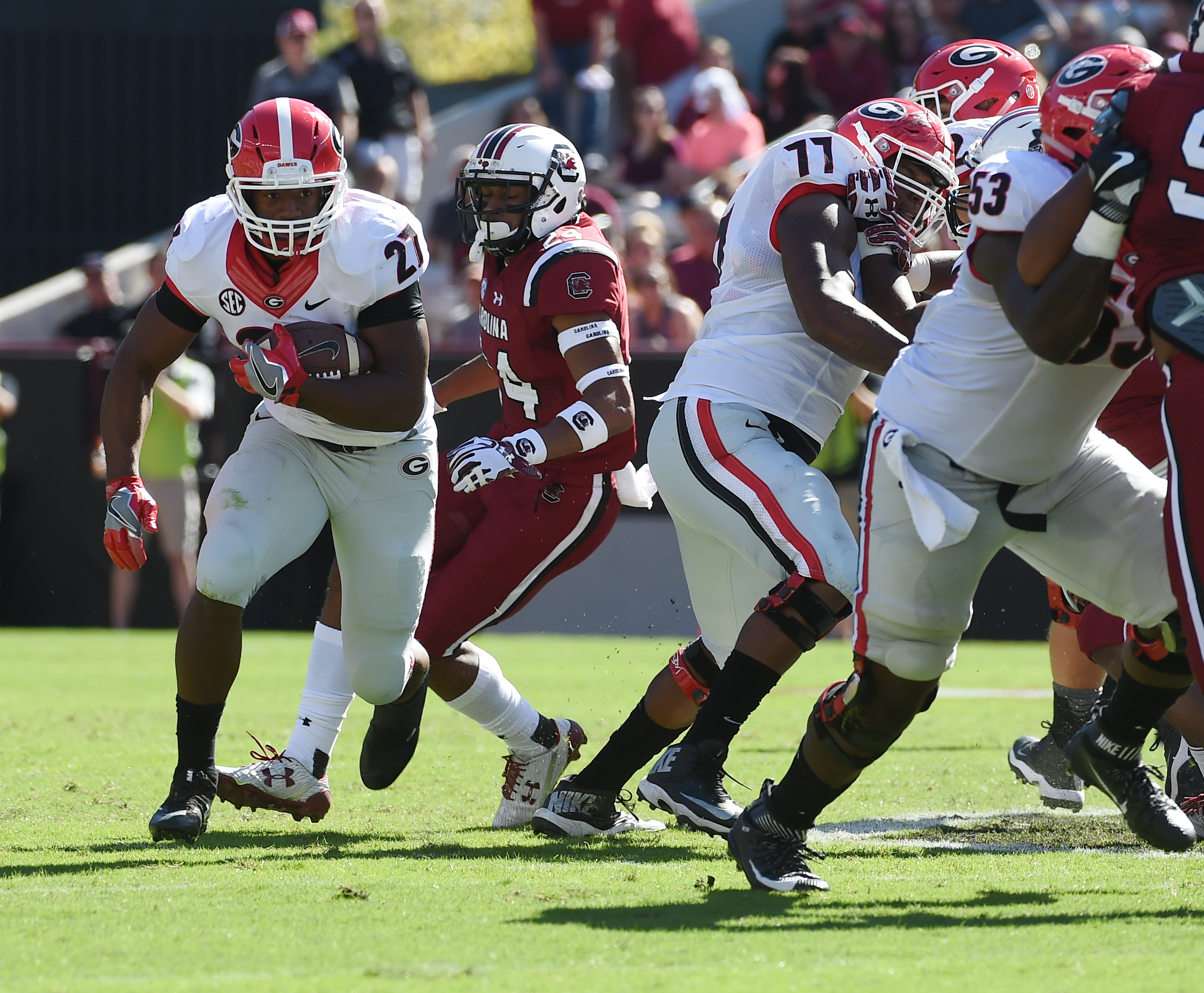 Georgia running back Nick Chubb (27) runs against South Carolina during the first half of an NCAA college football game on Sunday, Oct. 9, 2016, in Columbia, S.C. (AP Photo/Rainier Ehrhardt)