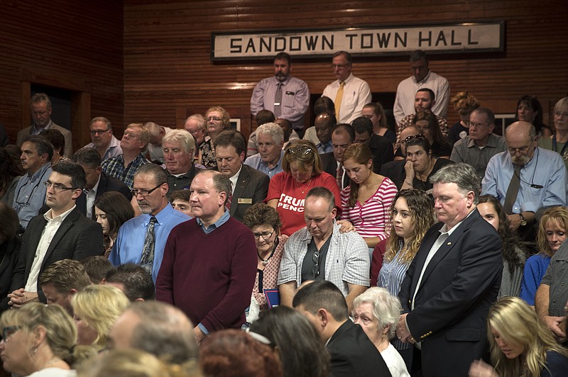 Attendees during a prayer at Donald Trump's town hall campaign event in Sandown, N.H., last Thursday.