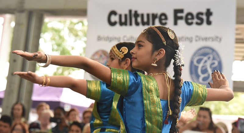 Gopi Patel, near right, extends her arms alongside Shresha Kidambi, as they perform the Alaripu dance.