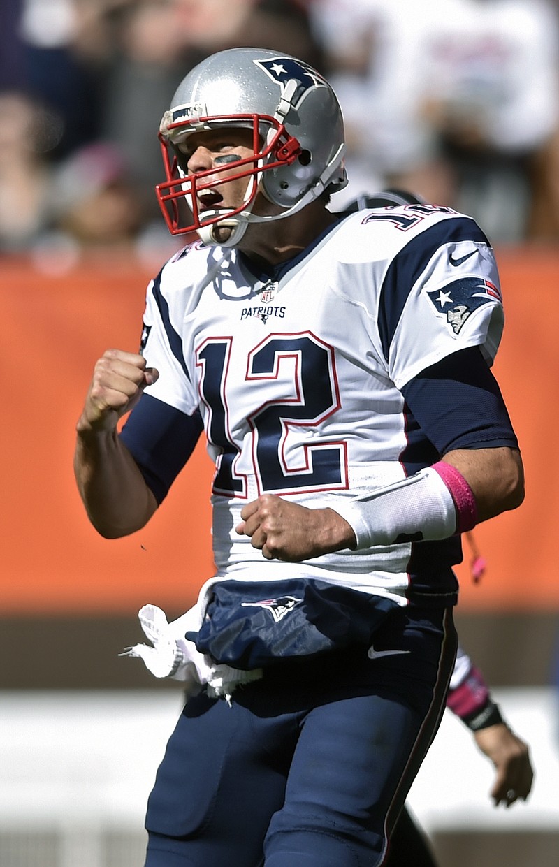 
              New England Patriots quarterback Tom Brady celebrates a touchdown in the first half of an NFL football game against the Cleveland Browns, Sunday, Oct. 9, 2016, in Cleveland. (AP Photo/David Richard)
            