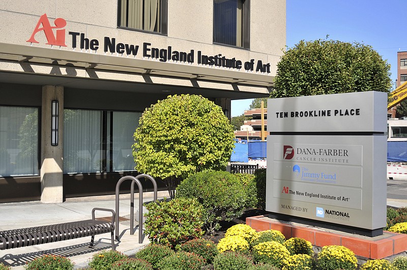 
              In this Monday, Oct. 3, 2016 photo shrubs rest near The New England Institute of Art, in Brookline. A chain of universities in India has proposed to buy two for-profit art schools in the U.S., one near Boston and one in New York City, and also bought a Long Island branch campus of St. John's University in September. While dozens of U.S. colleges have opened overseas campuses, few foreign schools have sought to build outposts here, in part because of the cost and tighter regulation. But since its founding in 2003, leaders of Amity University, a system of private colleges based in New Delhi, have dreamed of creating a global network of schools. (AP Photo/Collin Binkley)
            