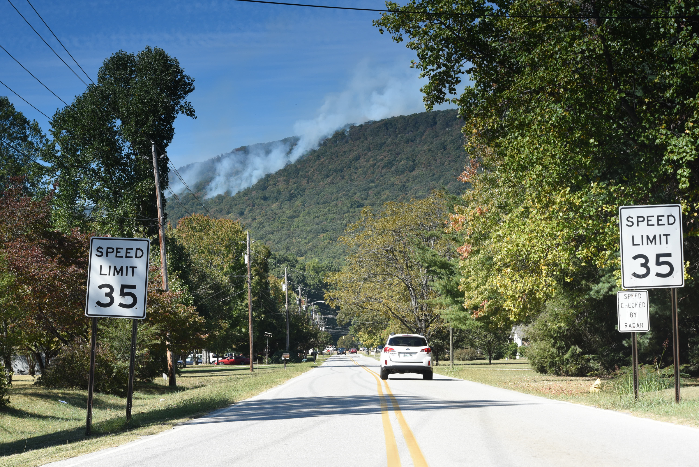 The Walden's Ridge fire burns above the Falling Water community on Tuesday in this view from Thrasher Pike in Soddy-Daisy.