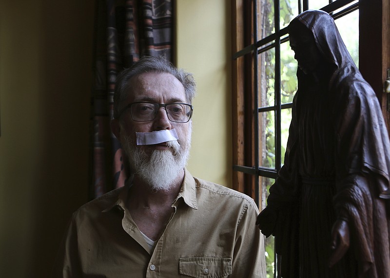 
              Father Graham Pugin poses for a photograph as he recovers at a residence in Johannesburg, Wednesday, Oct. 12, 2016. Pugin was hit in the face on Monday by a police rubber bullet at the gates of the Holy Trinity Catholic Church during fighting between South African police and protesting university students this week. (AP Photo/Denis Farrell)
            