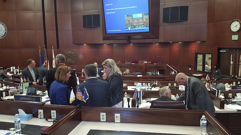 
              Republican lawmakers huddle as they discuss a bill during a special legislative session in Carson City, Nev., Tuesday, Oct. 11, 2016. The Nevada Legislature is deliberating bills that would authorize public funds for an NFL stadium and convention center expansion in Las Vegas. (AP Photo/Michelle Rindels)
            