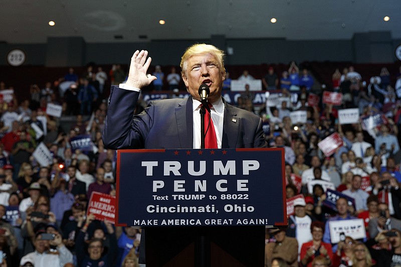 In this Oct. 13, 2015 file photo, Republican presidential candidate Donald Trump speaks during a campaign rally in Cincinnati, Ohio. (AP Photo/ Evan Vucci, File)
            