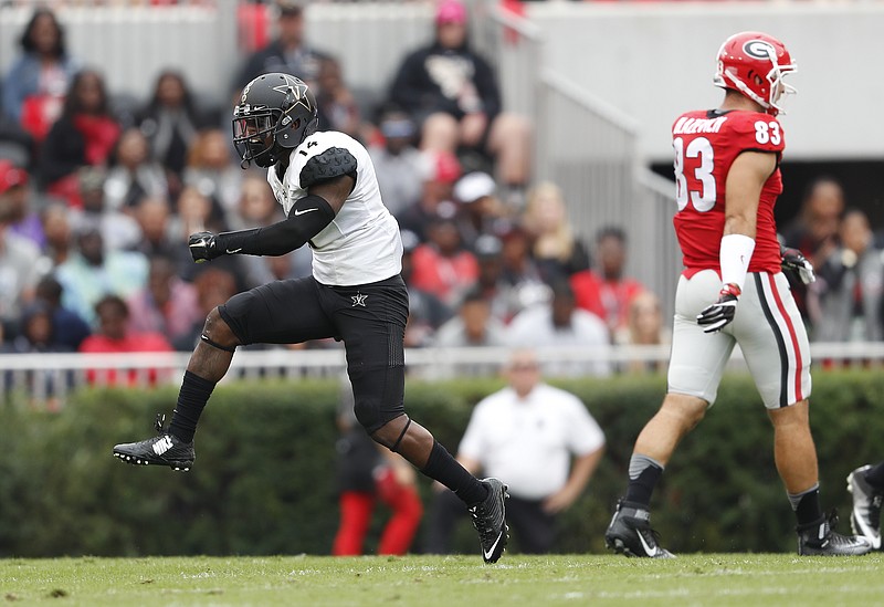 Vanderbilt safety Ryan White (14) reacts after a defensive stop in the first half of an NCAA college football  game against Georgia Saturday, Oct. 15, 2016, in Athens, Ga. (AP Photo/John Bazemore) 